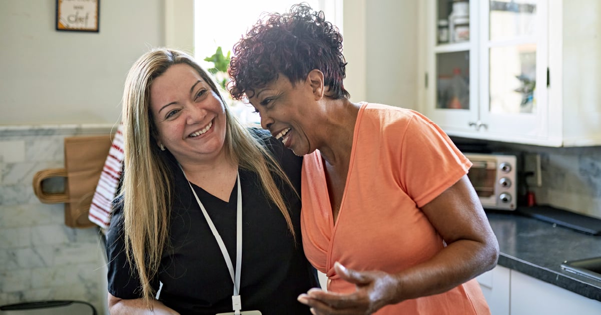 in-home care nurse working with a patient