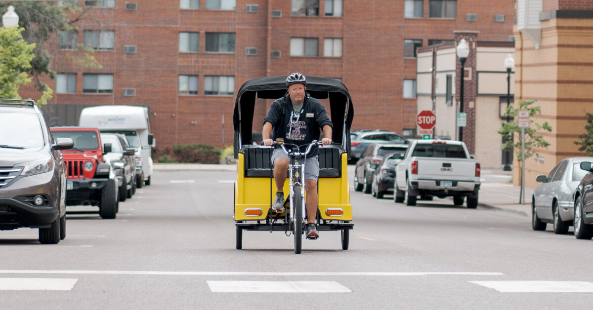Michael Kirchen drives Walker Methodist Pedicab