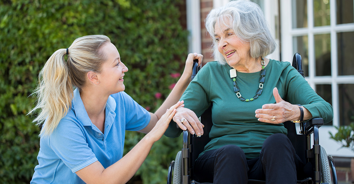 memory-care-nurse-socializing-with-dementia-resident