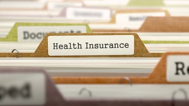 Health Insurance - Folder Register Name in Directory. Colored, Blurred Image. Closeup View..jpeg
